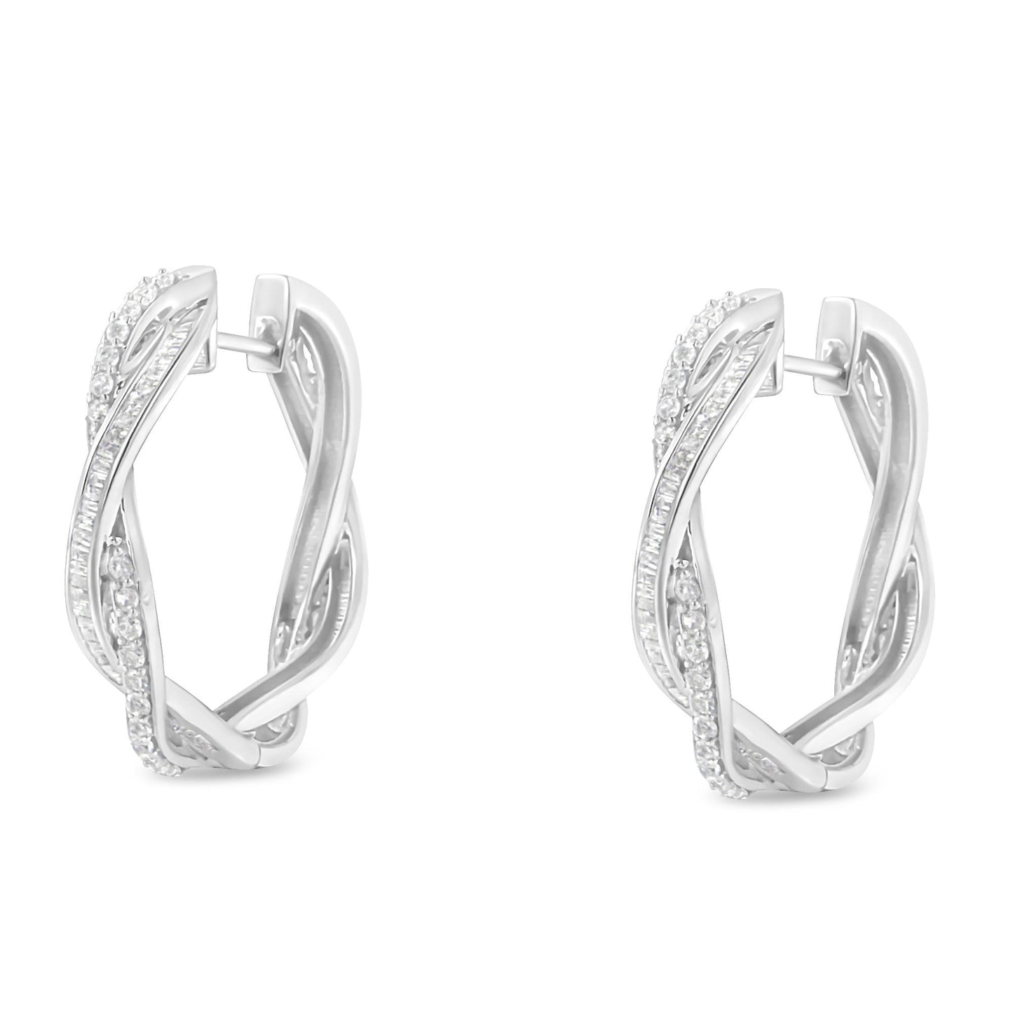 Pair of white metal earrings with an intertwined design, set with round prong-set white gemstones and baguette channel-set white gemstones, shown from a front angle.