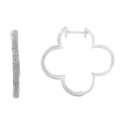 Pair of white metal earrings with a clover-like shape, each adorned with round white gemstones in prong settings, shown from side and front angles.