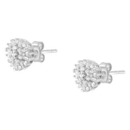Pair of white metal stud earrings with round and baguette shaped white gemstones, shown from a front angle.