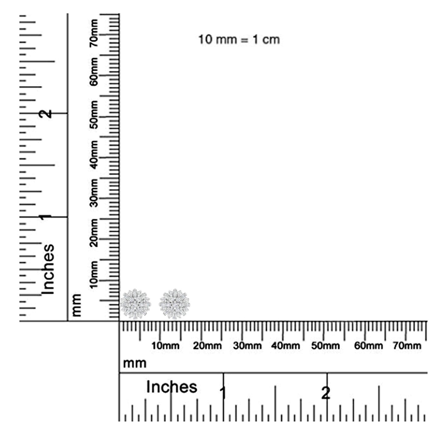 White metal earrings with round and baguette-shaped white gemstones in prong and invisible settings, shown at an angle on a ruler for size reference.