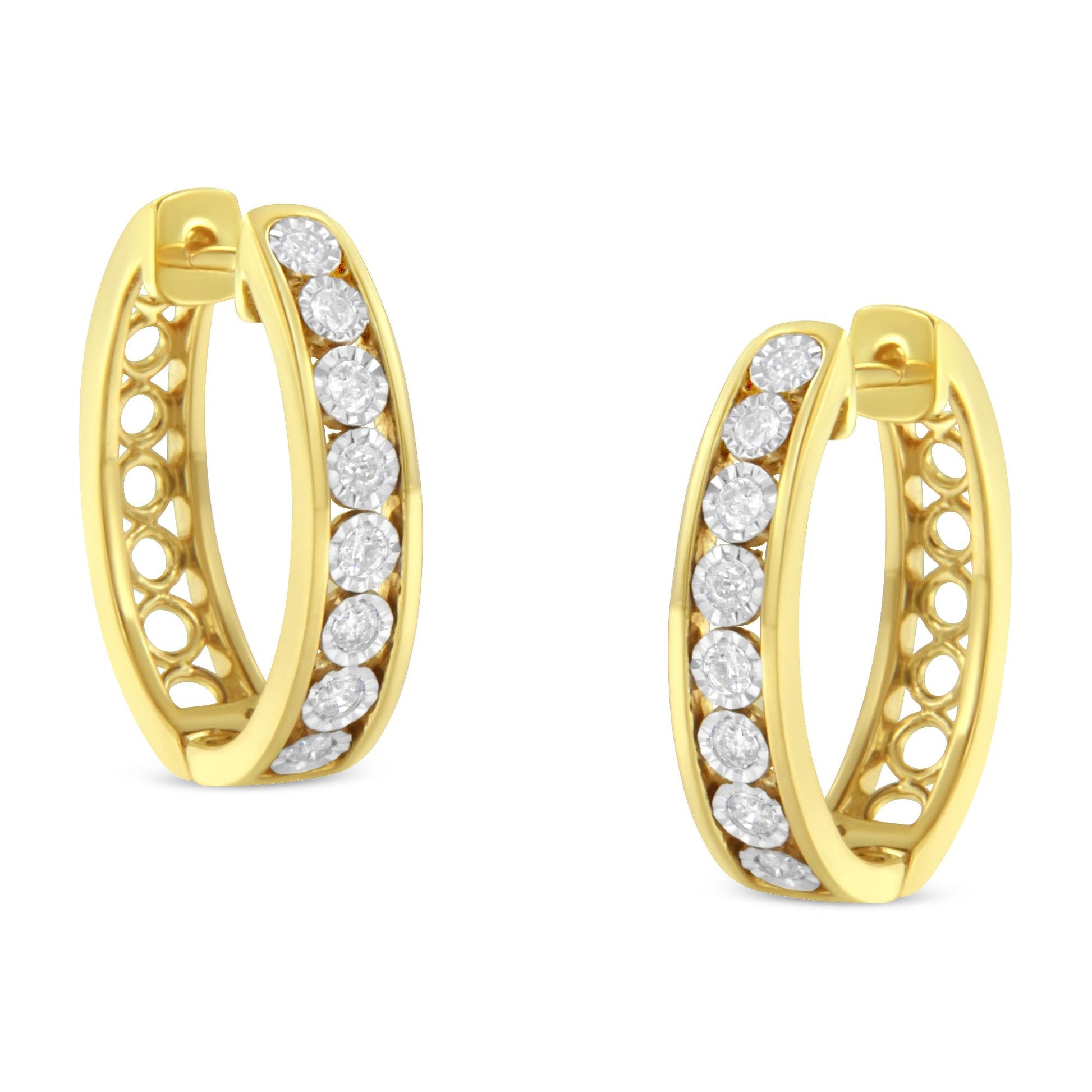 Front angled view of two-toned hoop earrings set with round white gemstones in a miracle setting along the front band.
