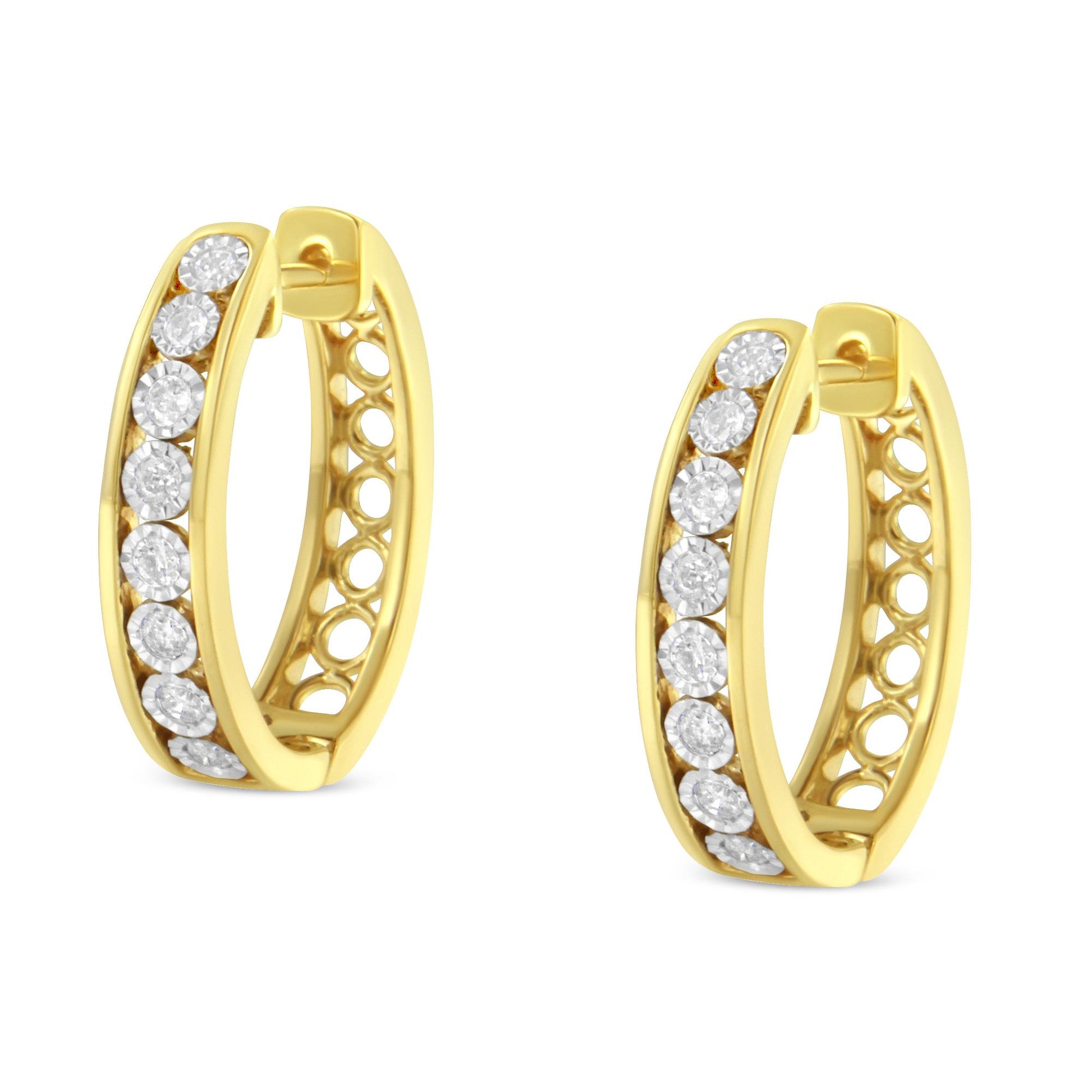 Front angled view of two-toned hoop earrings with round white gemstones in a miracle setting.