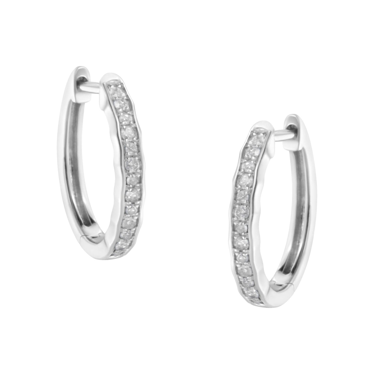 Pair of white metal hoop earrings with round white gemstones in pave setting, shown from a front angle.