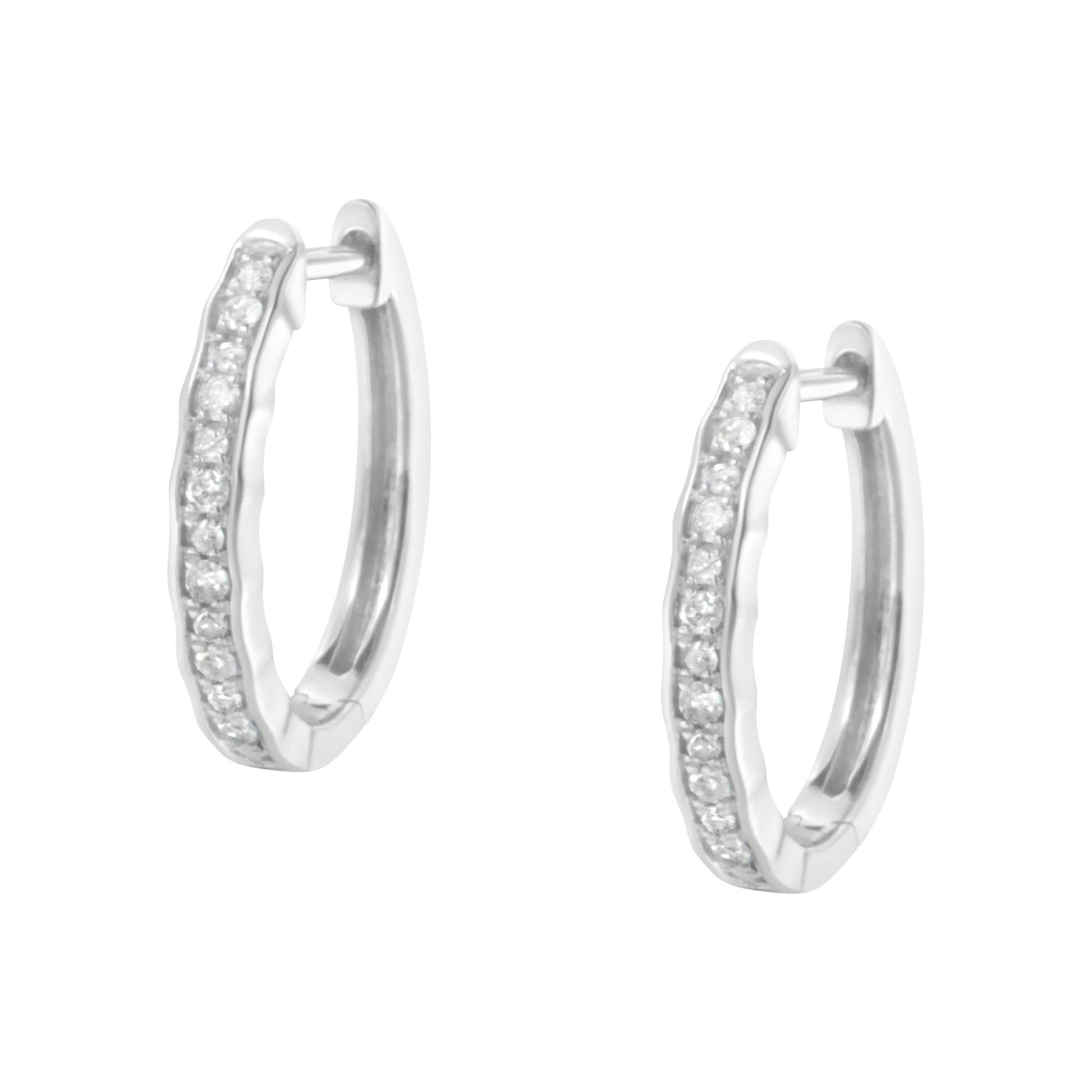 Pair of white metal hoop earrings with round white gemstones in a pave setting, shown from a slightly angled front view.