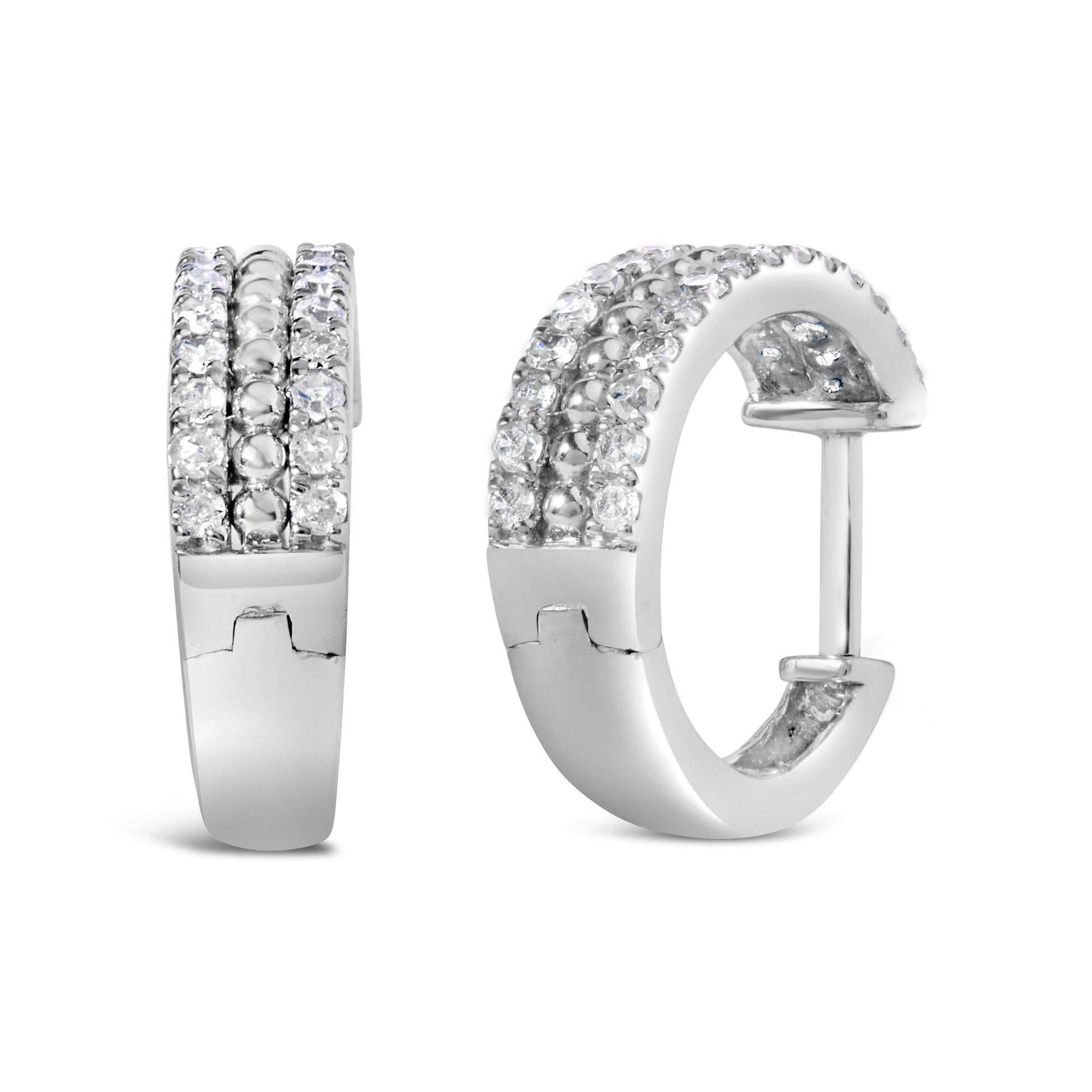 Front and angled view of a pair of white metal hoop earrings featuring two rows of round white gemstones in a pave setting.