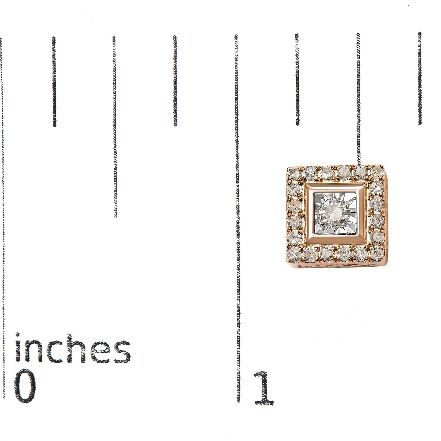 Close-up front view of a square rose metal earring with a central white gemstone in a miracle setting surrounded by smaller white gemstones in a prong setting, shown on a ruler for size reference.