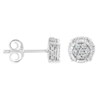 Close-up side and front view of a pair of white metal stud earrings with round white gemstones in prong settings arranged in a cluster.