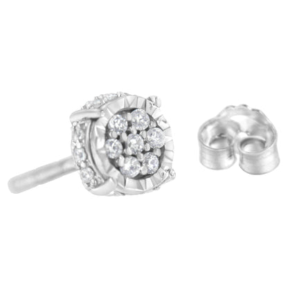 Close-up side angle of a white metal stud earring with round white gemstones in prong settings and a separate metal earring back.