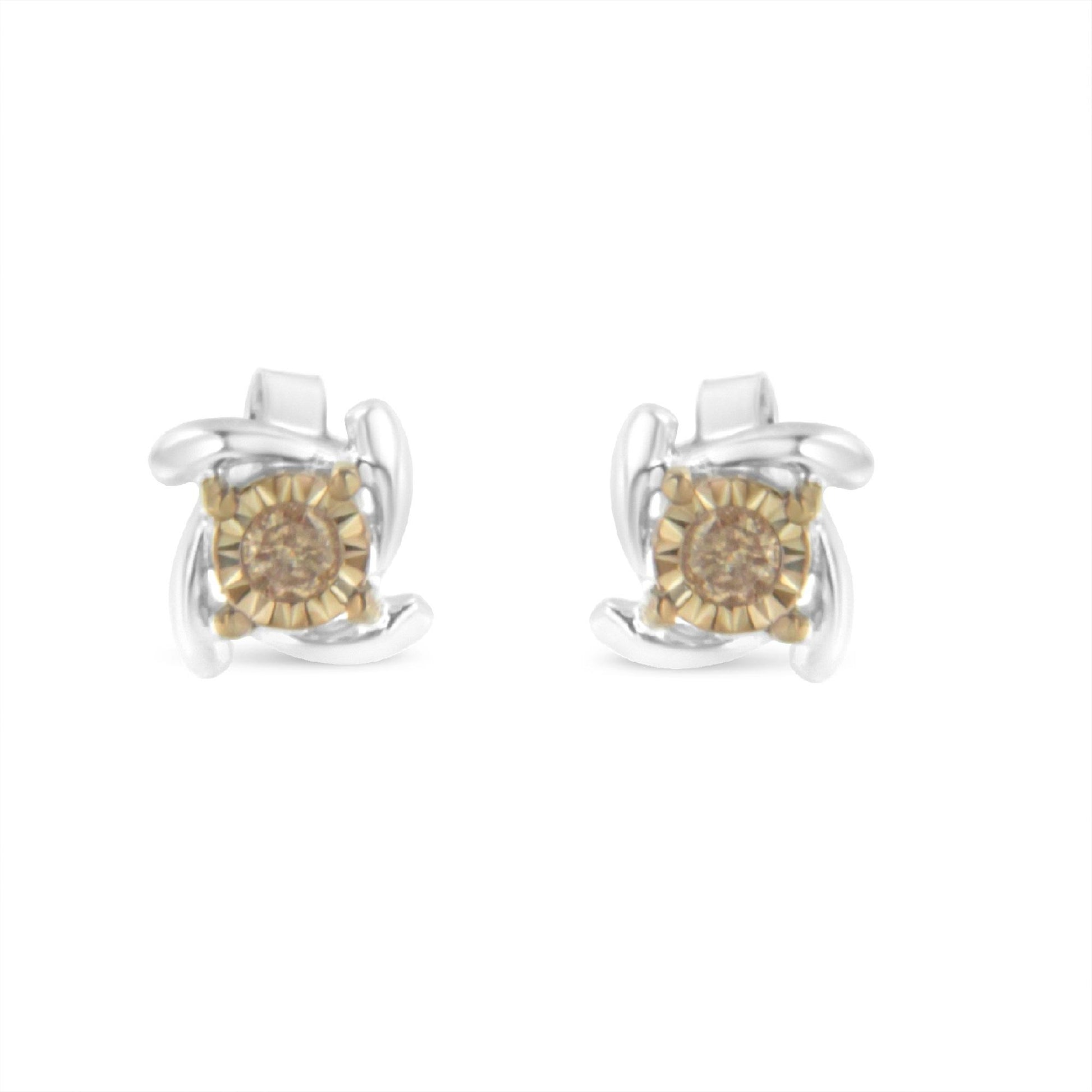 Front-facing view of two-toned stud earrings featuring round champagne-colored gemstones with a twisted metal design surrounding each stone.