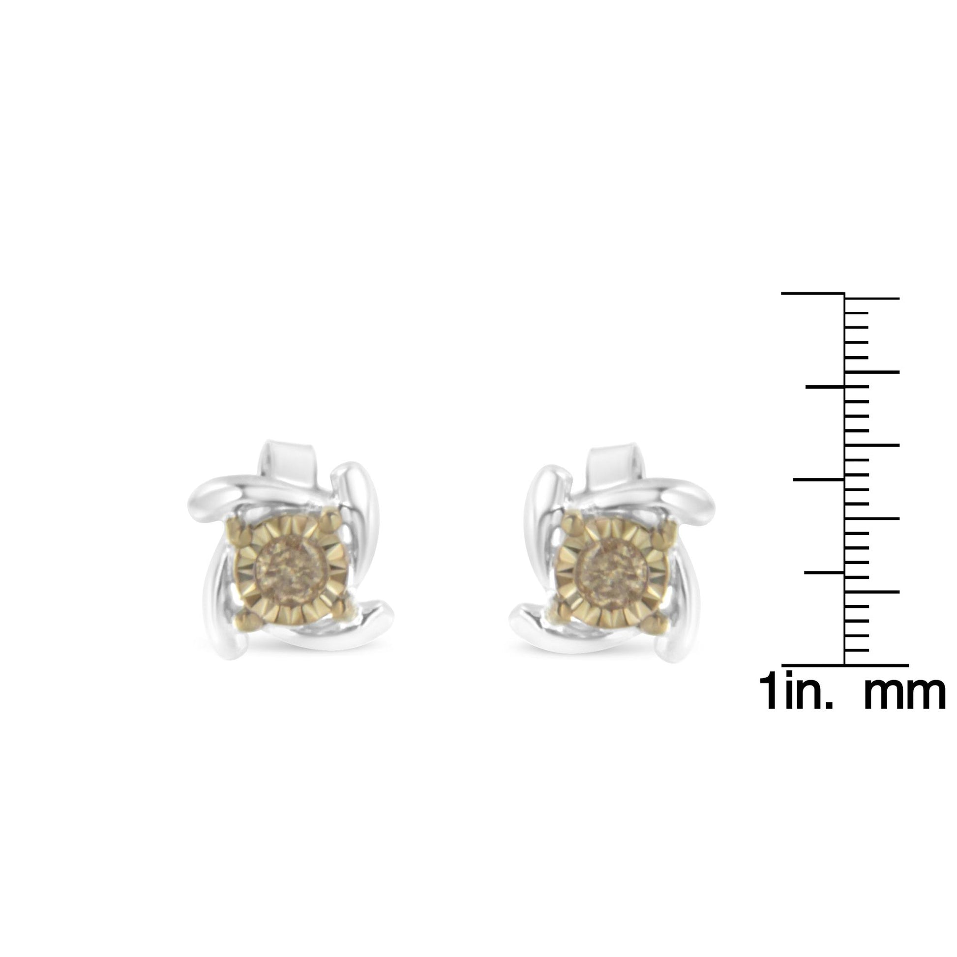 Front view of two-toned stud earrings with round champagne-colored gemstones in miracle settings shown next to a ruler for size reference.