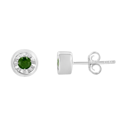 Front and side view of white metal stud earrings with round green gemstones in miracle settings.