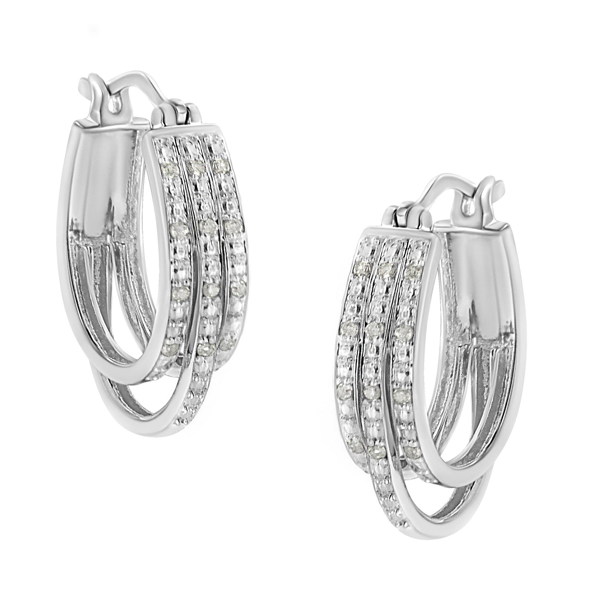 Pair of white metal hoop earrings with three overlapping bands, each set with round white gemstones in a pavé setting, shown at a slight angle.