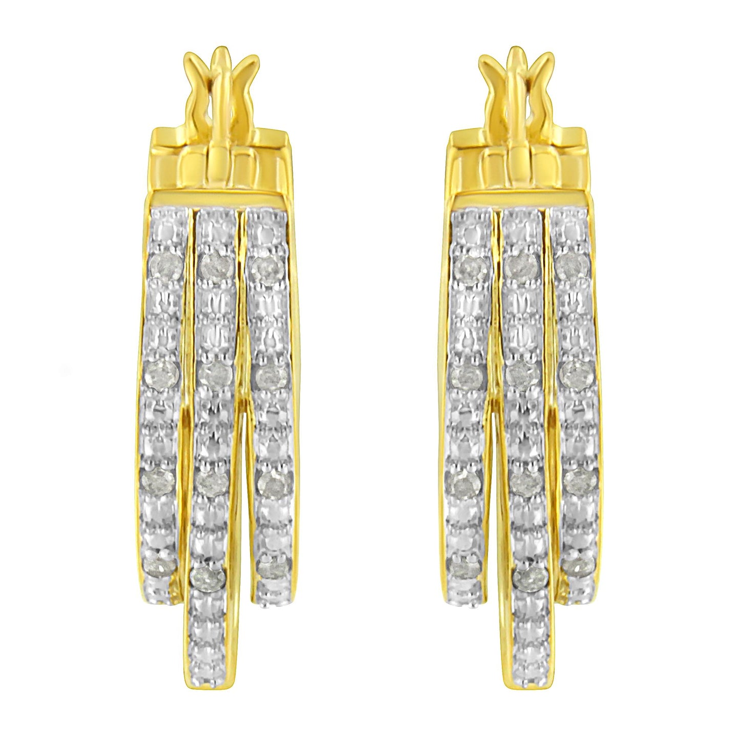 Front facing shot of a pair of yellow metal earrings featuring three vertical rows of white round pave-set gemstones.