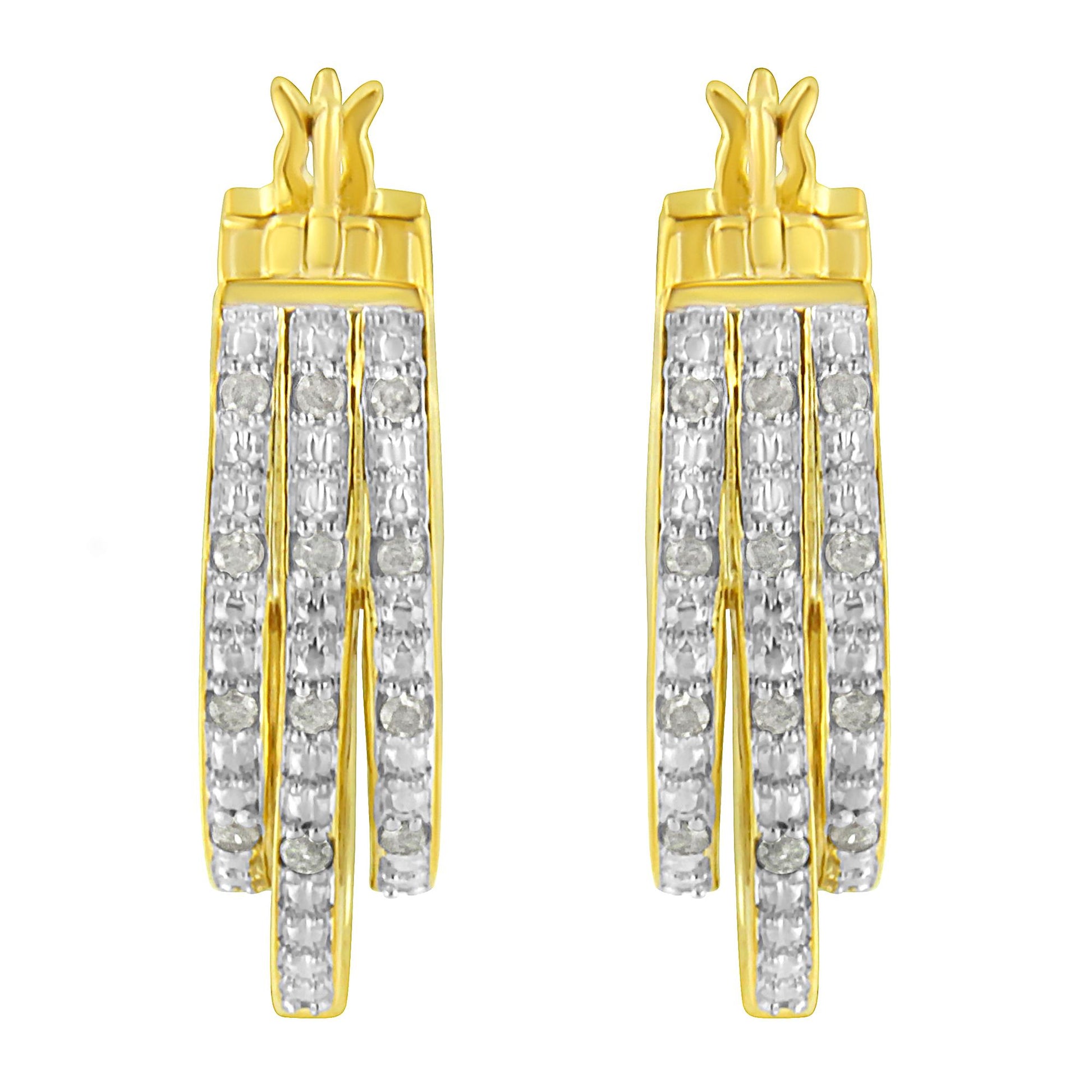 Front facing shot of a pair of yellow metal earrings featuring three vertical rows of white round pave-set gemstones.