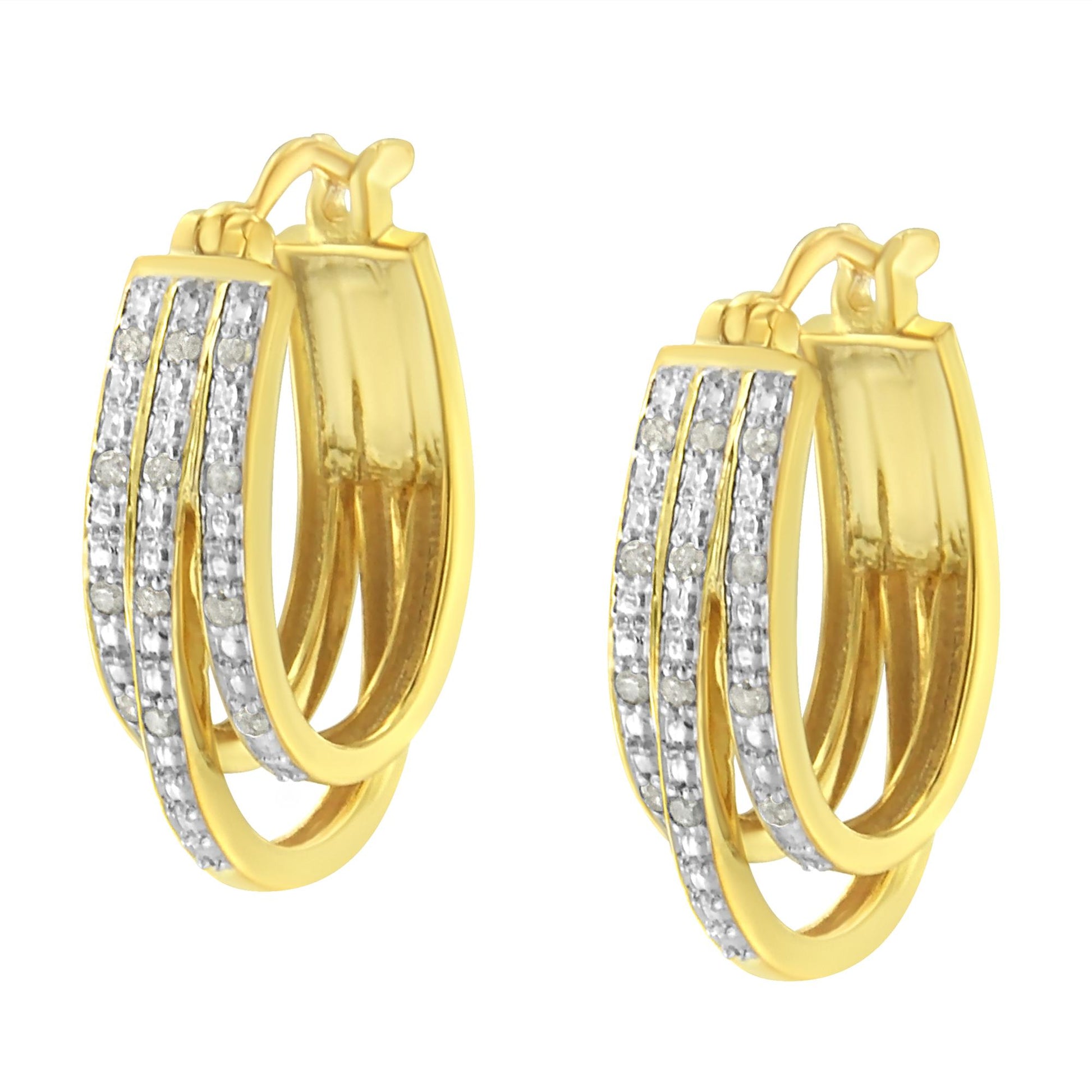 Pair of yellow metal hoop earrings with three rows of white gemstones in pave setting, shown from a front angle.