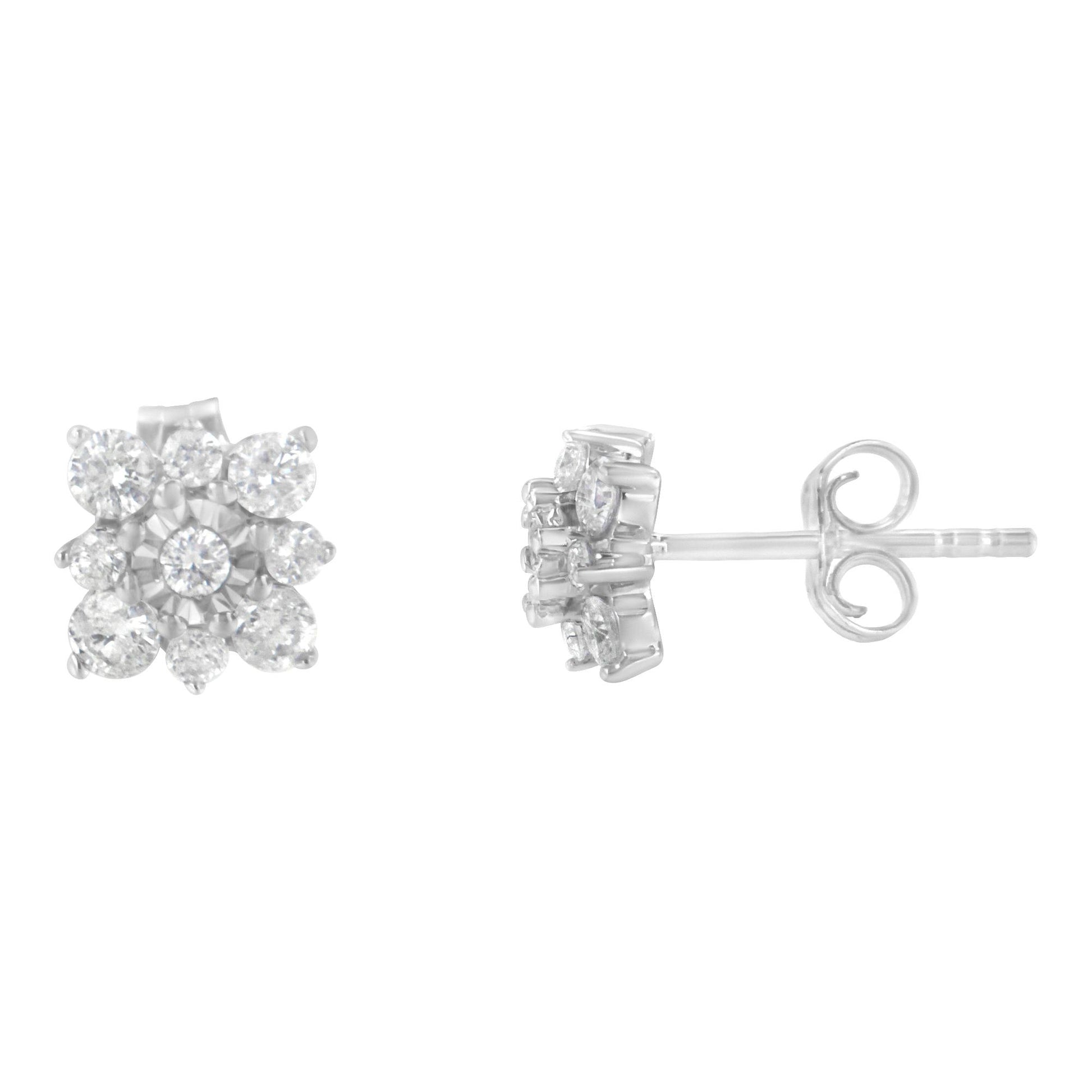 Front and side views of a white metal stud earring with round white gemstones in prong and miracle settings arranged in a floral cluster, shown against a white background.