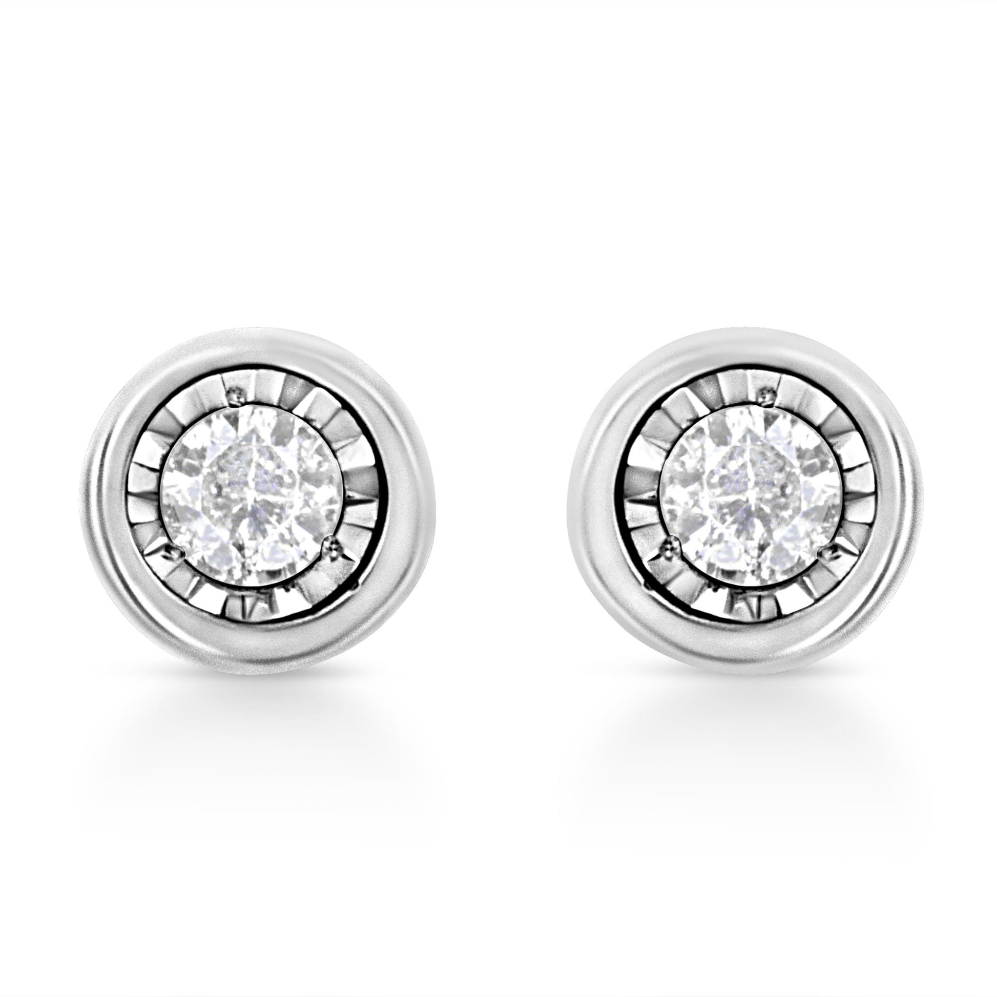 Pair of white stud earrings with round white gemstones in miracle setting, shown from front angle.