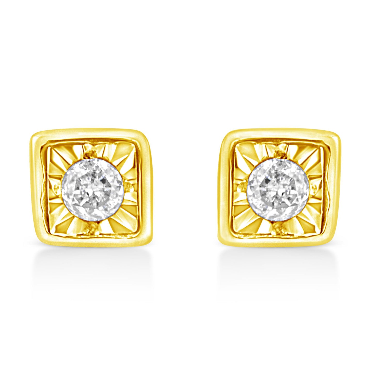 Front view of a pair of yellow metal square earrings with a round white gemstone in the center with a radiant pattern around it.