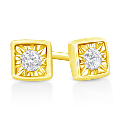 Close-up front angle of yellow metal square-shaped earrings each featuring a round white gemstone in a miracle setting.