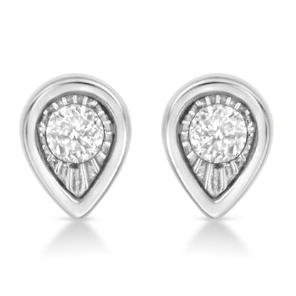 Front view of white metal teardrop-shaped earrings each with a round white gemstone in a miracle setting.