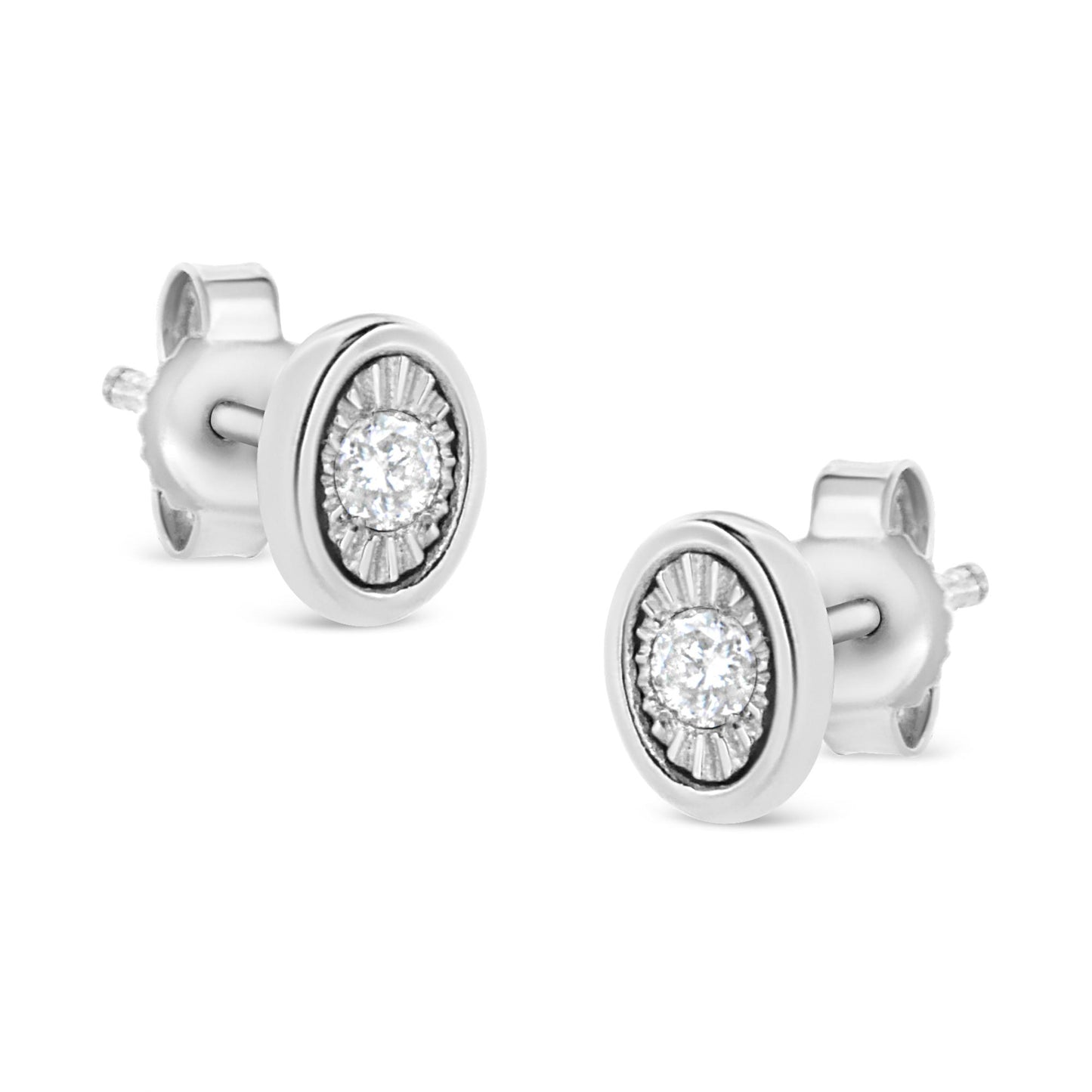 Pair of white stud earrings with round white gemstones set in miracle settings, shown from an angled front view.