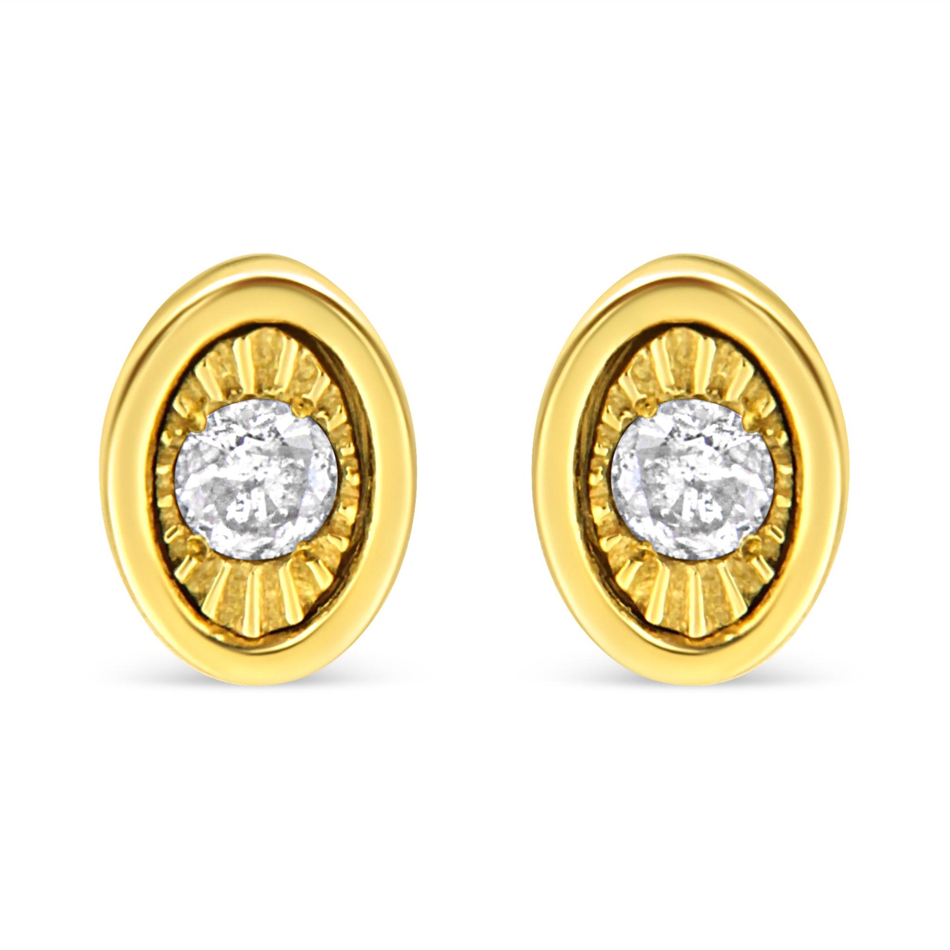 Front view of yellow metal oval earrings, each set with a round white gemstone in miracle setting.