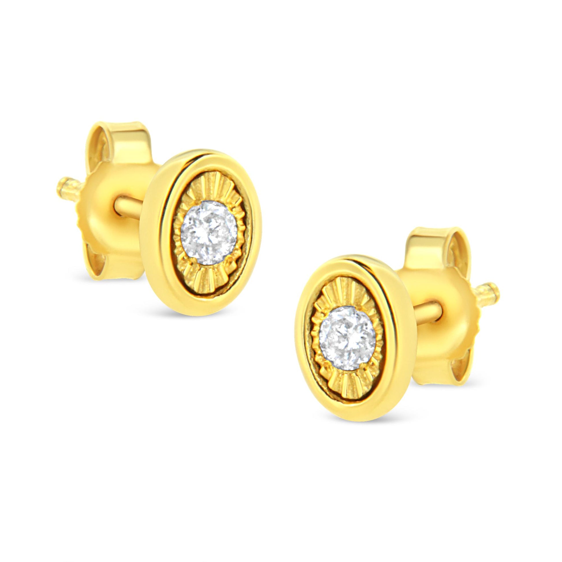 Pair of yellow metal stud earrings with round white gemstones set in a miracle setting, shown at a slight angle.