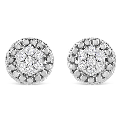 Front view of white metal round stud earrings with a cluster of white gemstones in a pave setting.