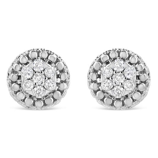 Front view of white metal round stud earrings with a cluster of white gemstones in a pave setting.