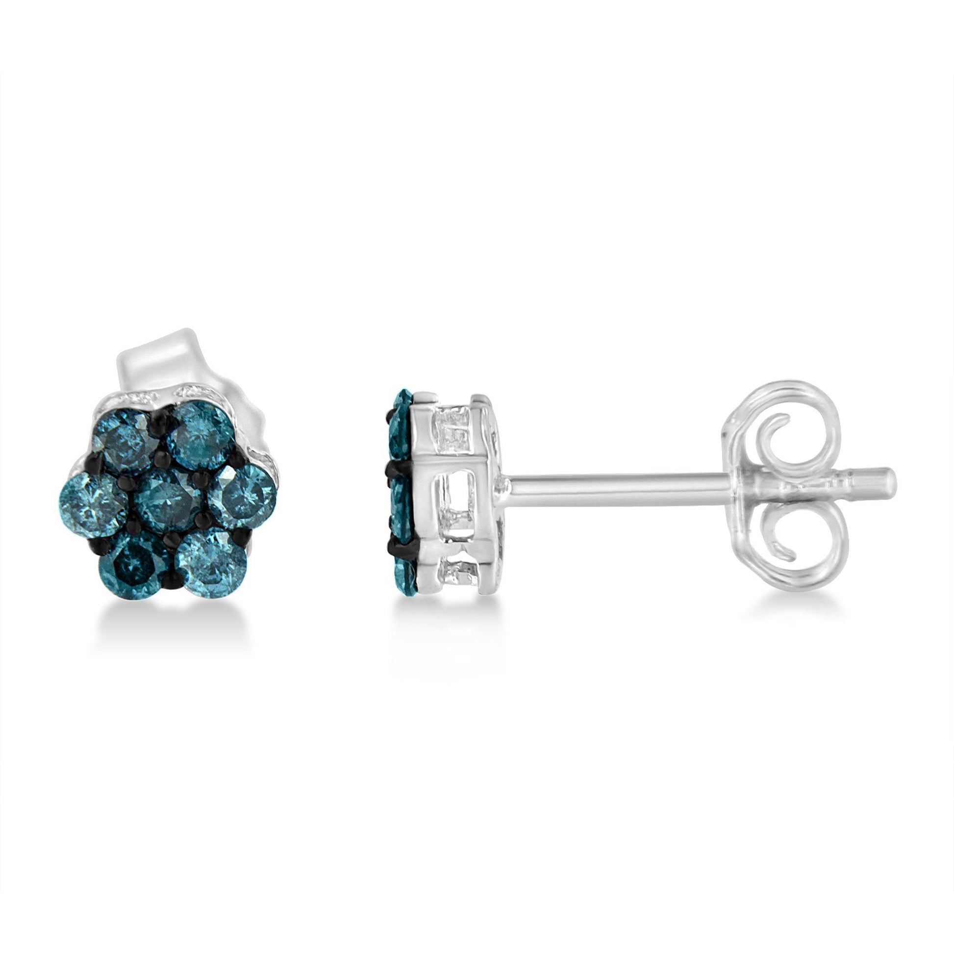 Pair of white metal stud earrings with round blue gemstones in prong settings, shown from front and side angles.