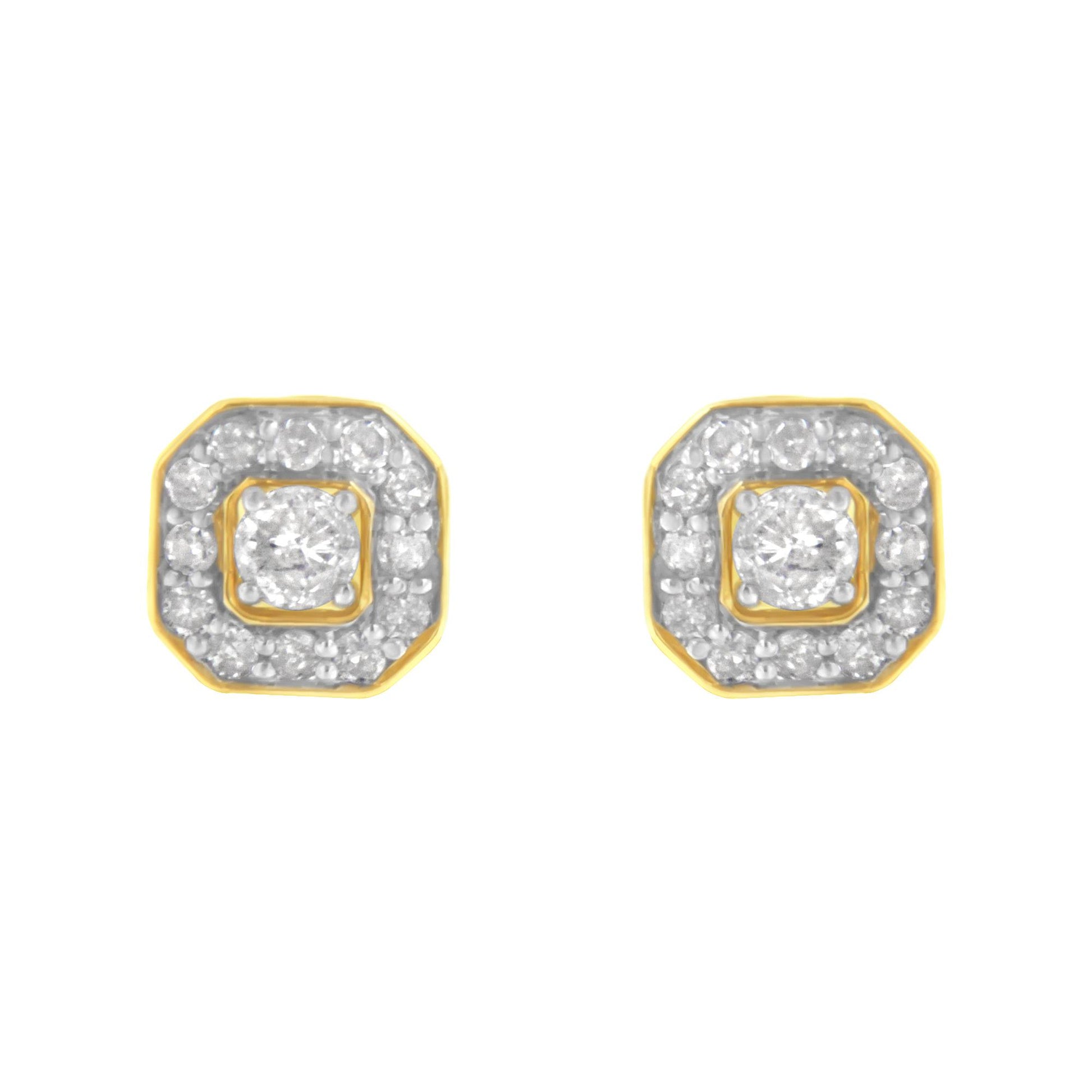 Front view of yellow metal earrings with a central round white gemstone in prong setting surrounded by smaller round white gemstones in pave setting.
