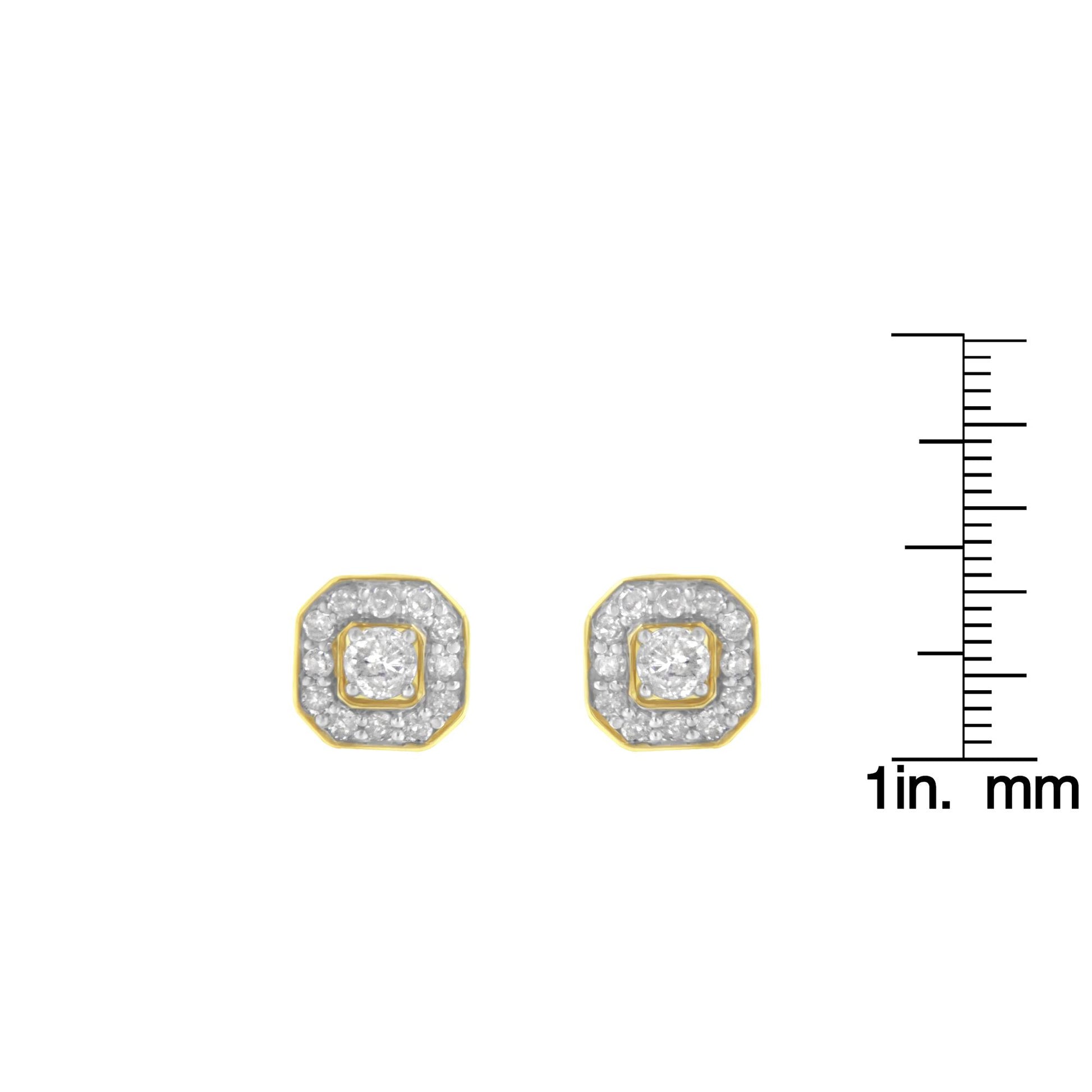 Front view of yellow metal square-shaped stud earrings with a central round prong-set white gemstone surrounded by smaller round pave-set white gemstones, shown next to a ruler for size reference.