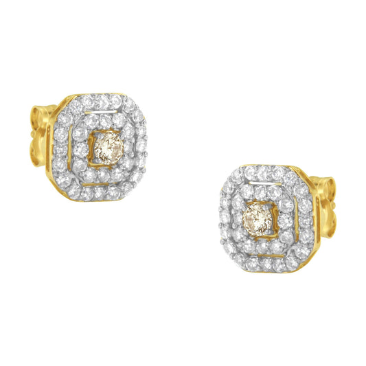 Front angle view of yellow metal stud earrings with a central round white gemstone in prong setting, surrounded by two rows of smaller round white gemstones in pave setting.
