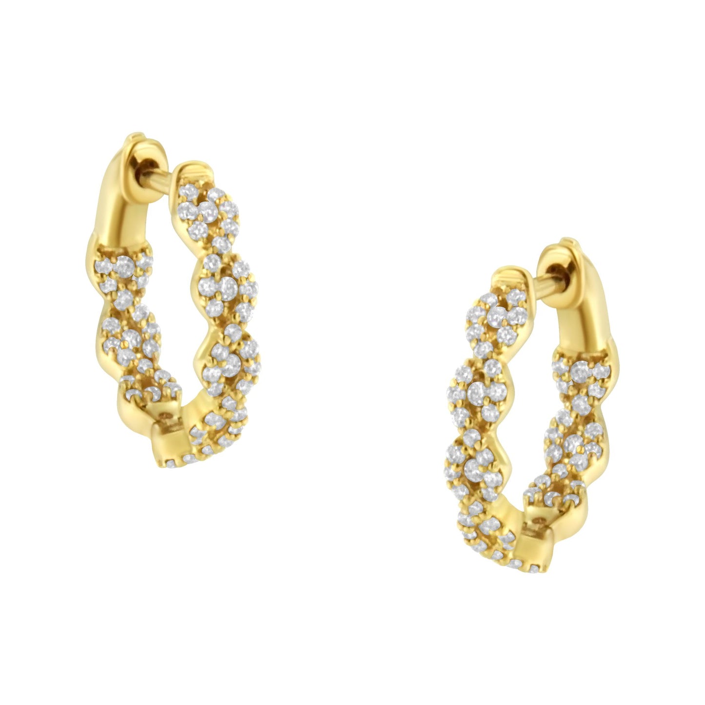 Pair of yellow metal hoop earrings with twisted design, adorned with multiple small white gemstones, shown at a slight angle.