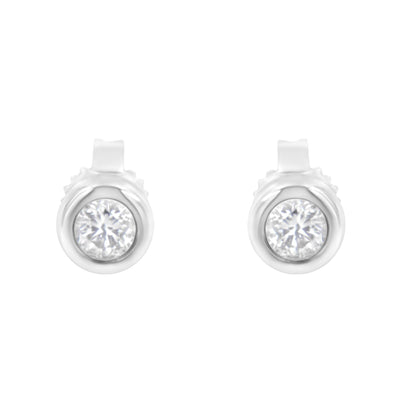 Front view of white metal bezel set round white gemstone stud earrings.