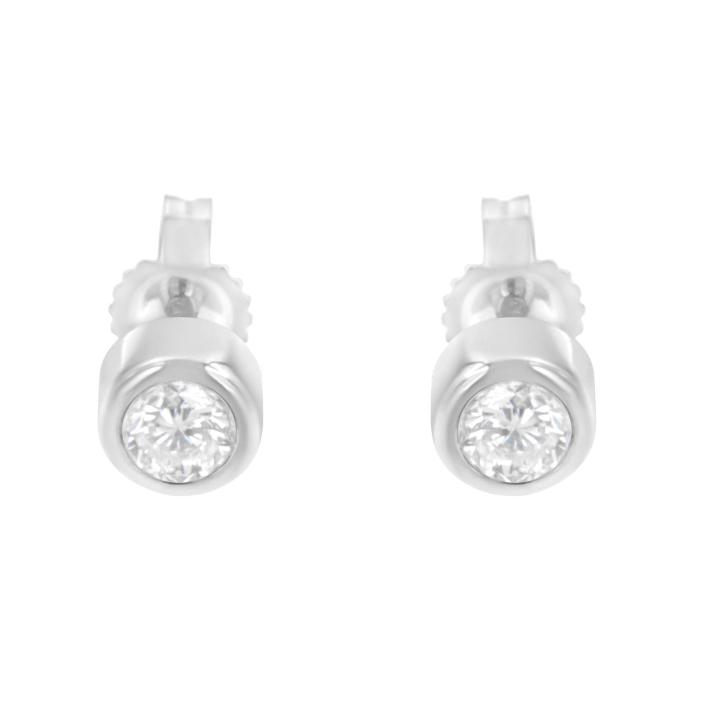 Front view of white metal stud earrings with round white gemstones in bezel settings.