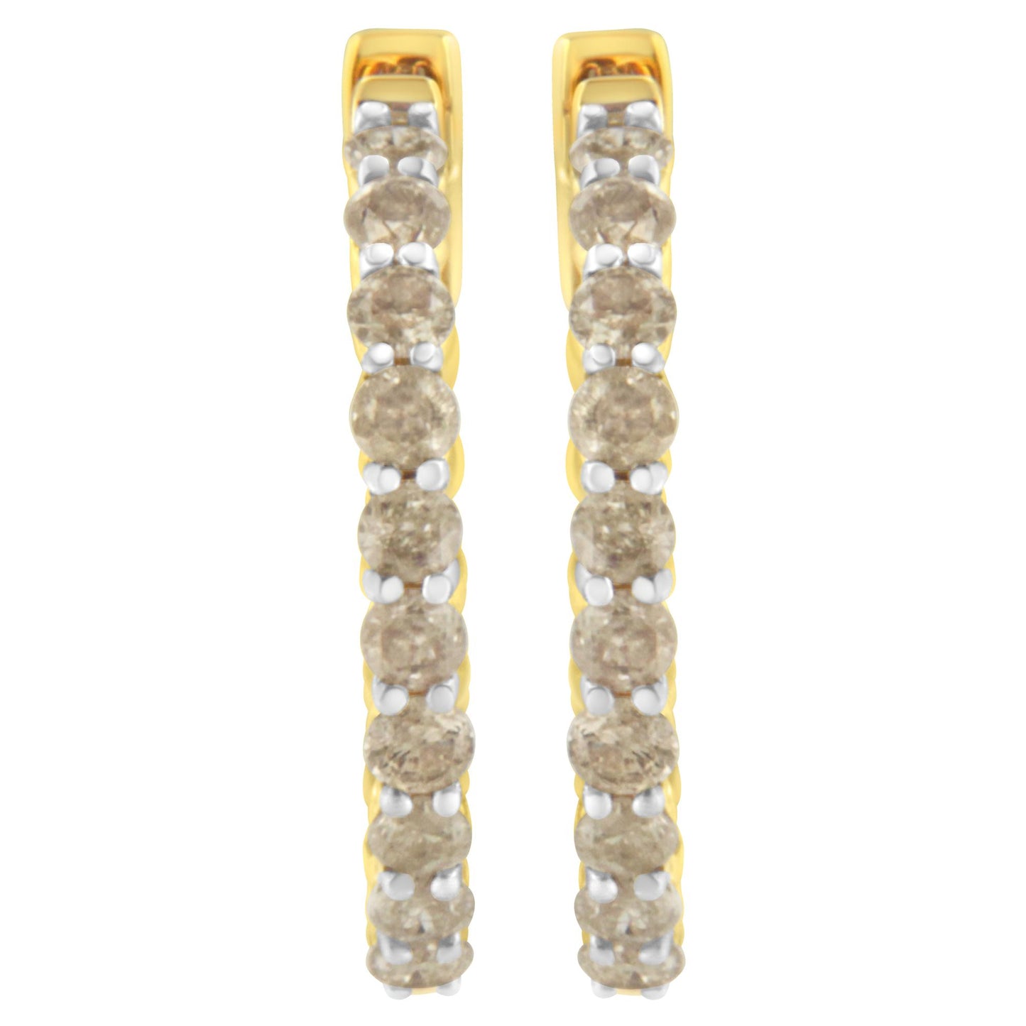 Front-facing close-up of a pair of yellow metal hoop earrings set with round prong-set brownish gemstones.