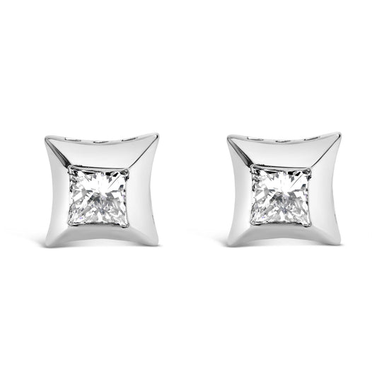 Front angle view of white metal square earrings with bezel-set white princess-shaped gemstones.