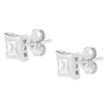 Pair of white metal stud earrings with bezel-set white princess-shaped gemstones, shown in a front-angle view.