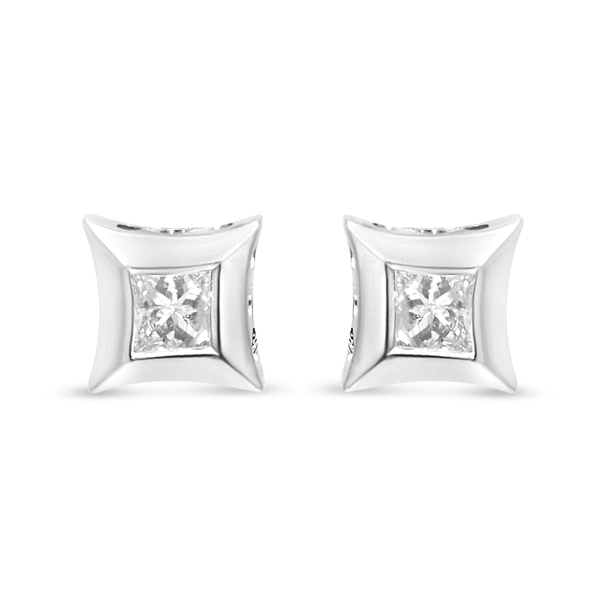 Front view of a pair of square shaped white metal earrings each with a princess-cut white gemstone in a channel setting.
