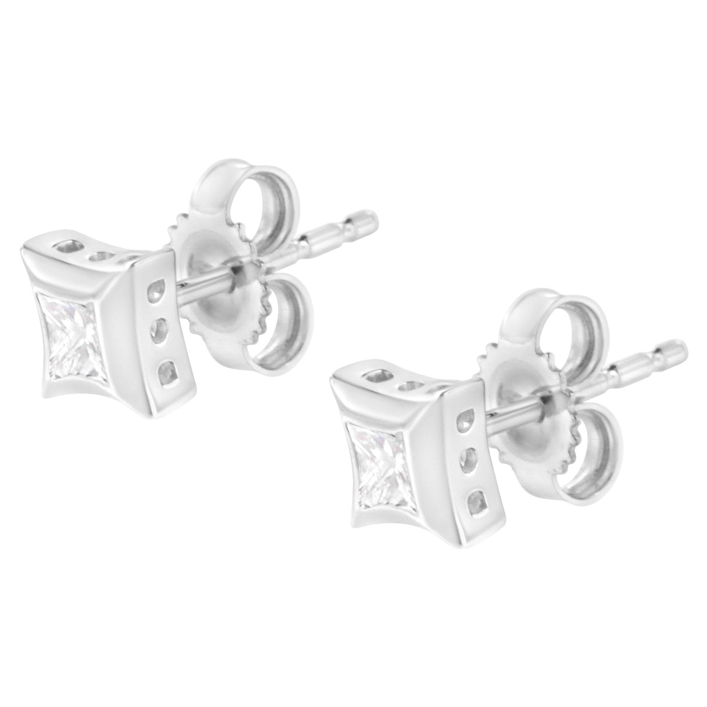 Pair of white metal stud earrings with princess-shaped white gemstones in a channel setting, shown from a side angle.