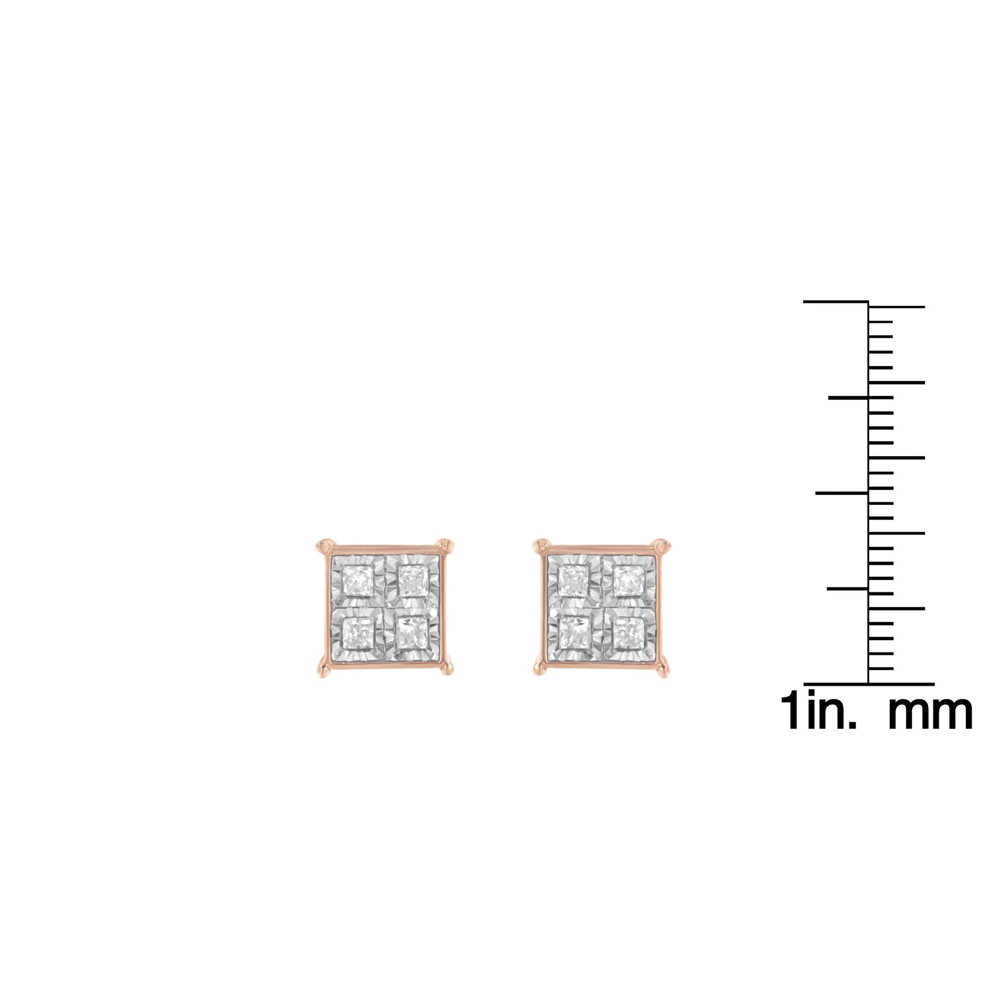 Front view of a pair of rose metal square stud earrings with multiple white princess shape gemstones, shown next to a ruler for size reference.