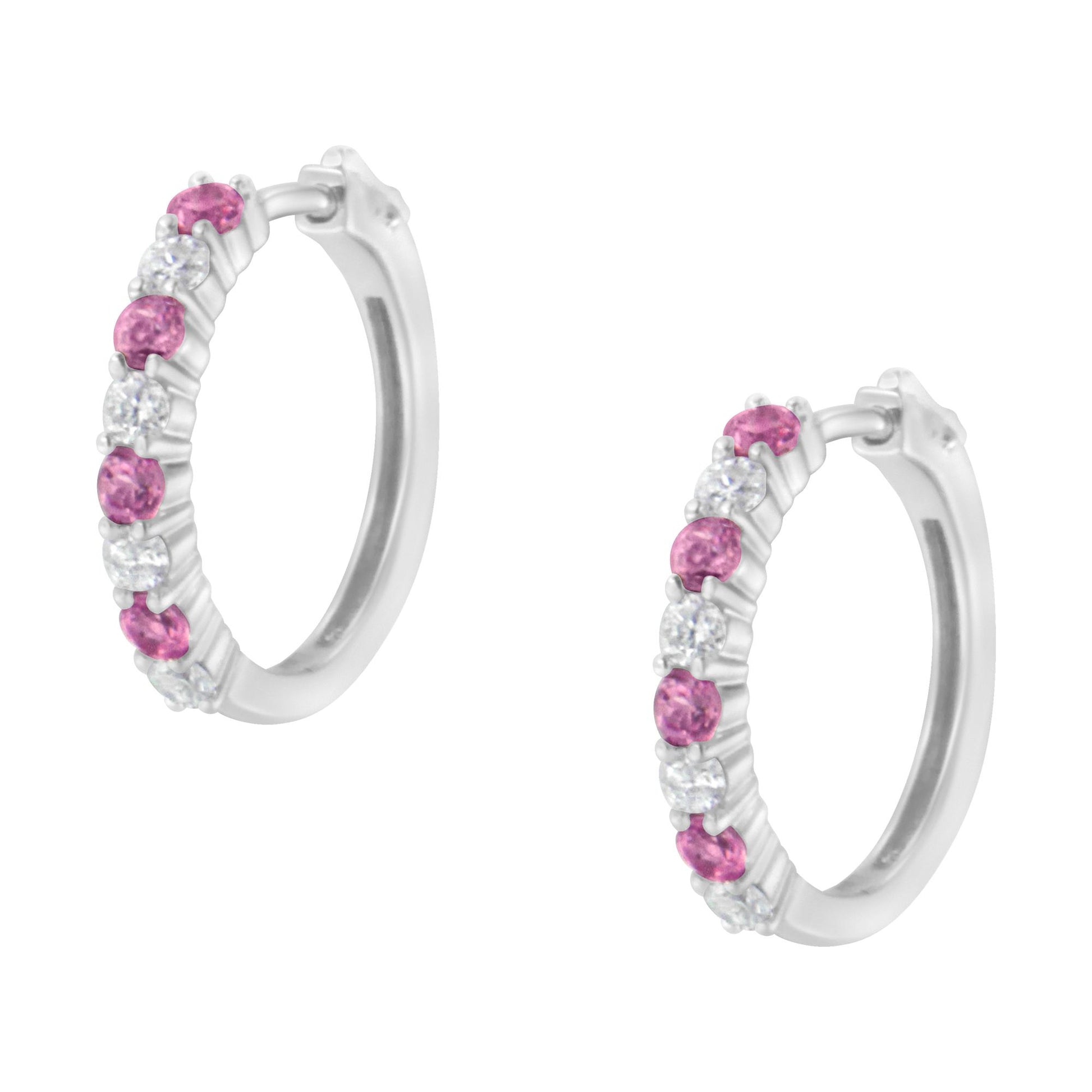 Pair of white metal hoop earrings with alternating round pink and white gemstones in prong settings, shown from a front angle on a white background.