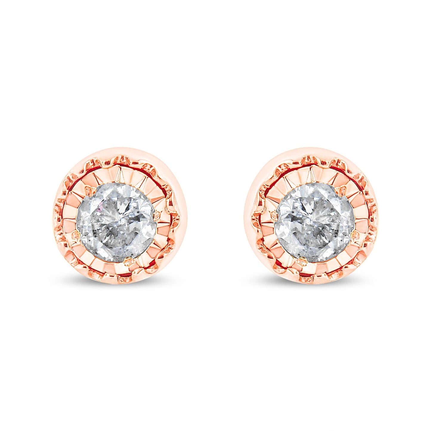 Front facing view of a pair of rose metal stud earrings each featuring a round white gemstone in a miracle setting.