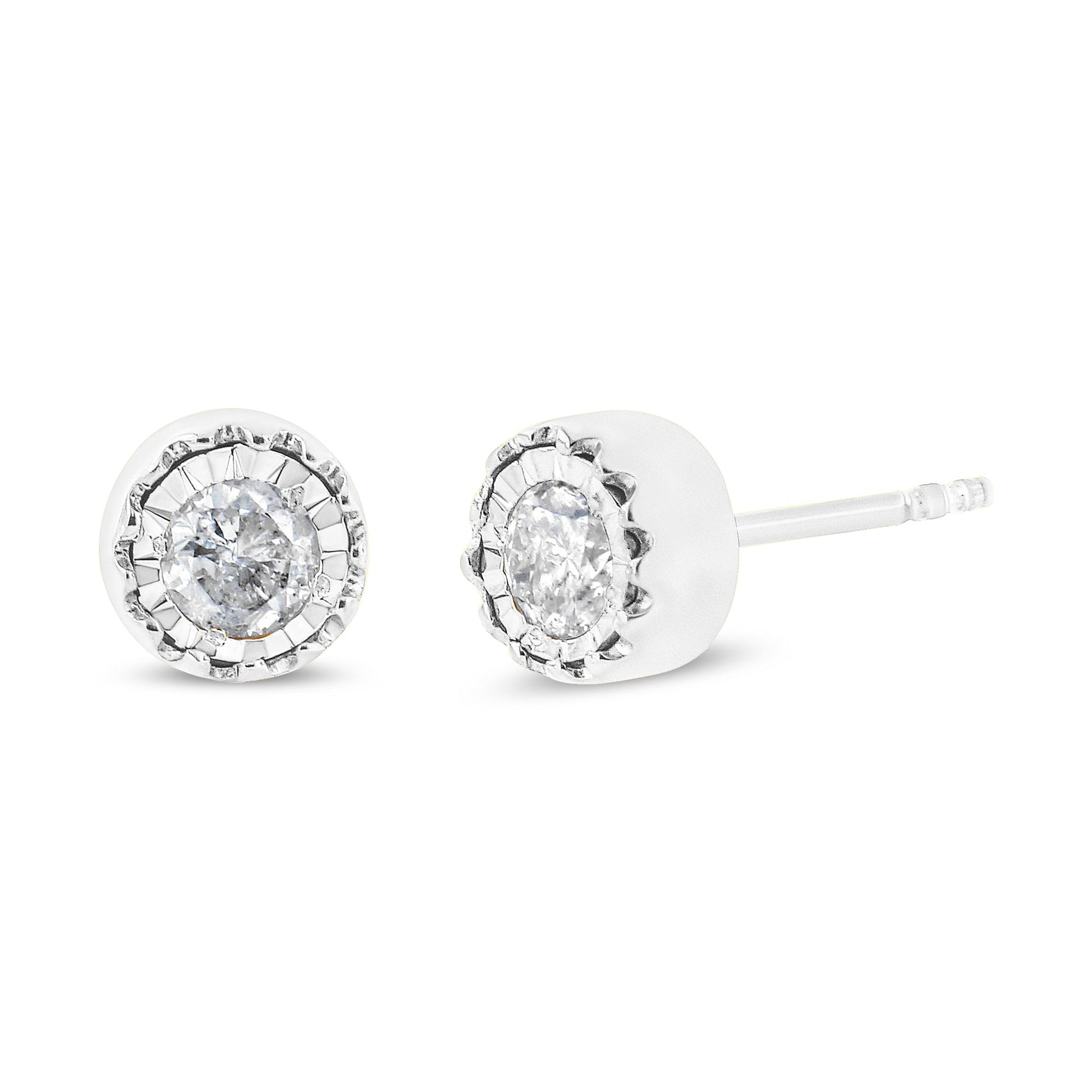 Close-up front and side view of white metal stud earrings with round white gemstones in miracle settings.