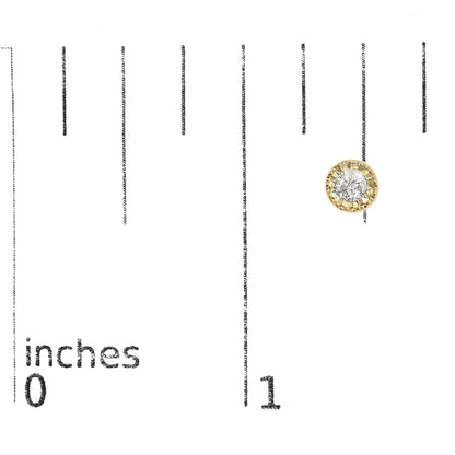 Single yellow metal earring with round white gemstones in miracle setting, shown on a ruler for size reference, front view.