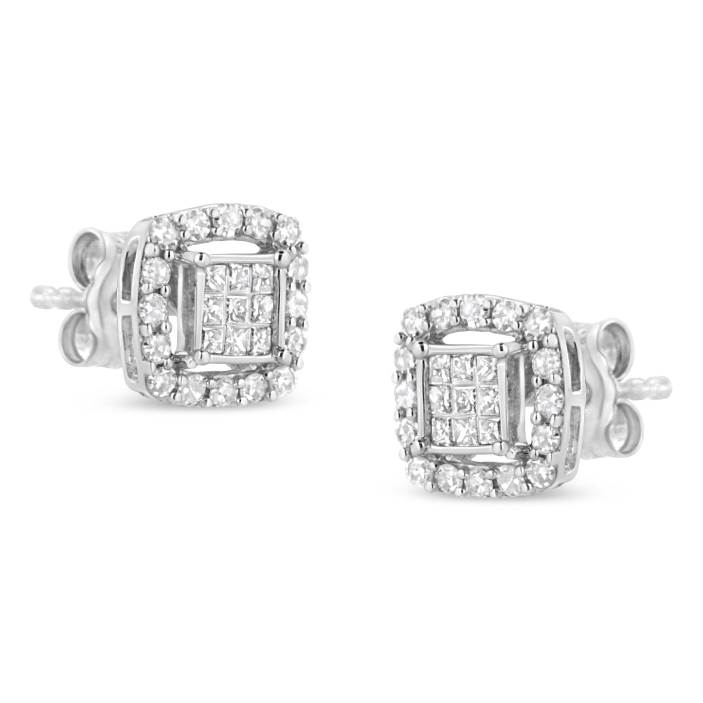 Close-up front angle view of a pair of white metal stud earrings featuring central square cluster of princess-shaped white gemstones in invisible setting, surrounded by a halo of round white gemstones in prong setting.
