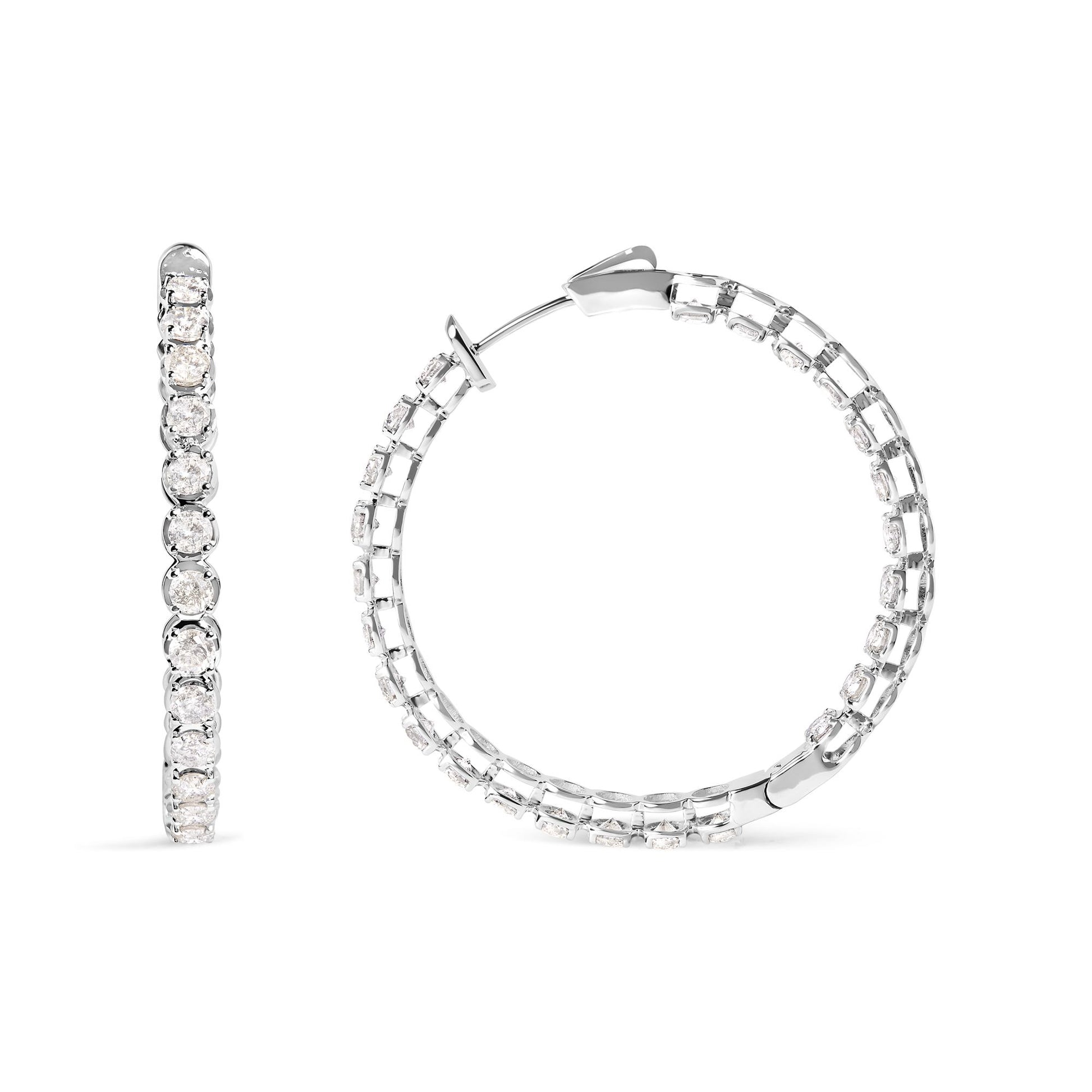 White metal hoop earrings with round white gemstones in prong settings, shown in front and side views on a white background.