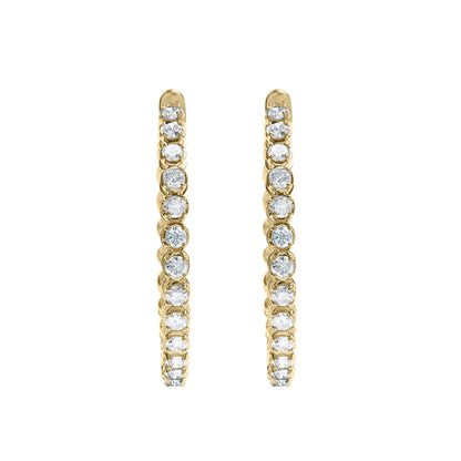 Pair of yellow metal hoop earrings with round white gemstones in prong settings, shown from the front angle on a white background.
