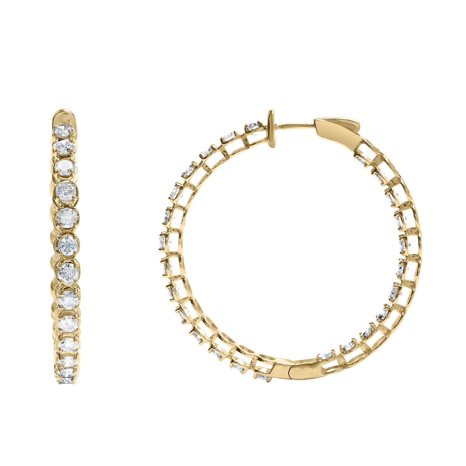 Close-up front and side view of yellow hoop earrings with round white gemstones in prong settings along the outer edges.